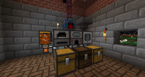 set of modded machines from Thermal Expansion, connected with energy pipes and chests underneath