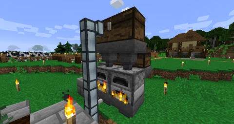 an automatic charcoal setup, with furnaces feeding into and being fed by hoppers and chests, the whole setup being supplied by itemducts