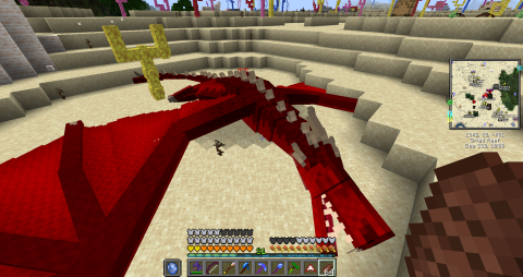 the corpse of a red fire dragon in a desert