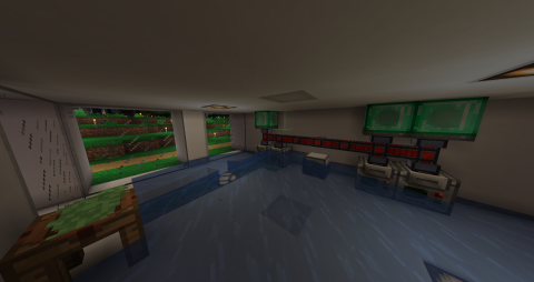 the interior of a flooded lab, with a green slime trail across the floor