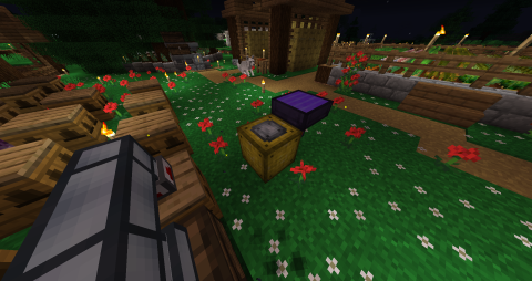 a yellow apiary block sits next to a purple solar panel